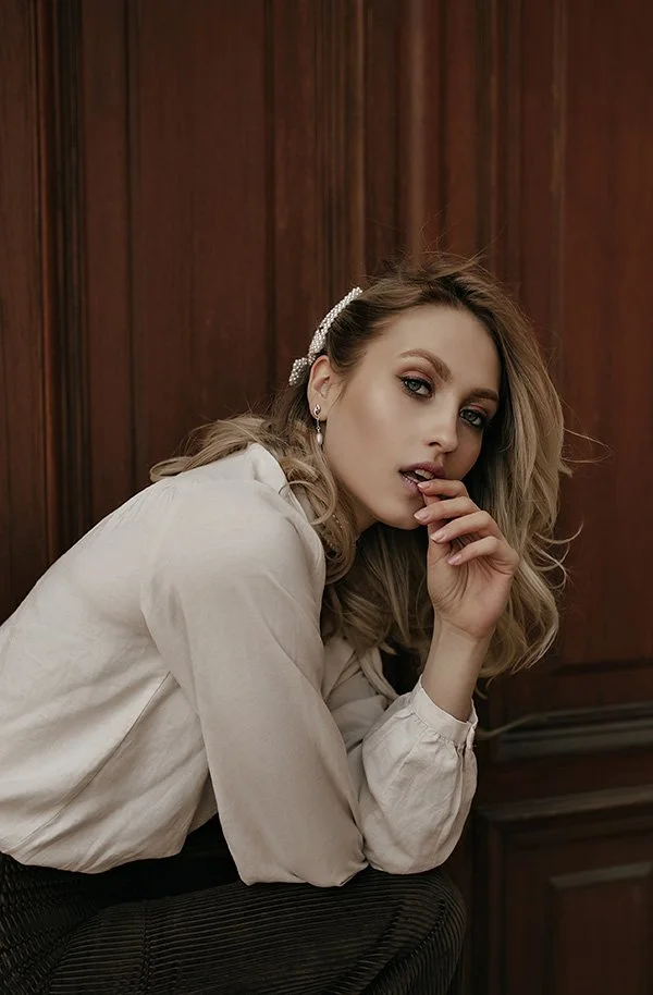 calm-thoughtful-blonde-young-lady.webp