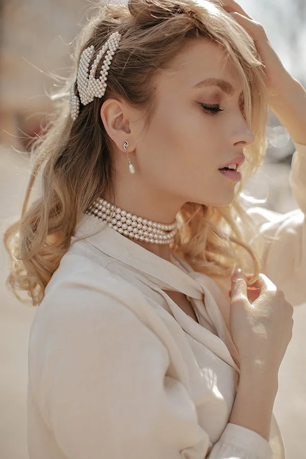 curly-blonde-young-woman.webp